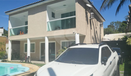Casa à venda com 4 quartos, sendo 3 suítes, no condomínio Residencial Nelson Pinto, Rio de Janeiro - RJ