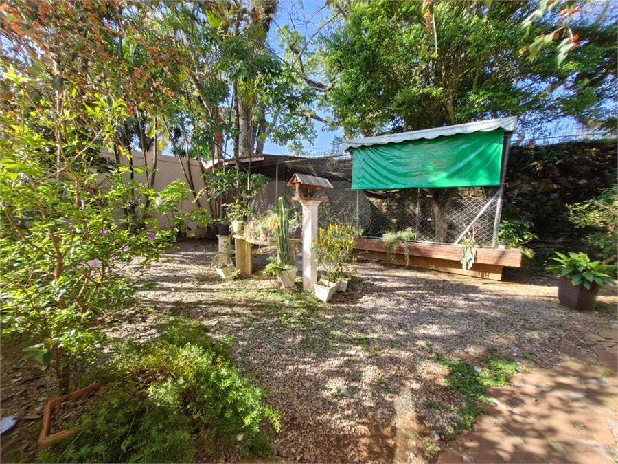 Casa à venda com 4 suítes no condomínio Villa Viana II, Cotia - SP