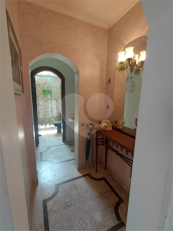 Casa à venda com 4 suítes no condomínio Ville Bourghese, São Paulo - SP