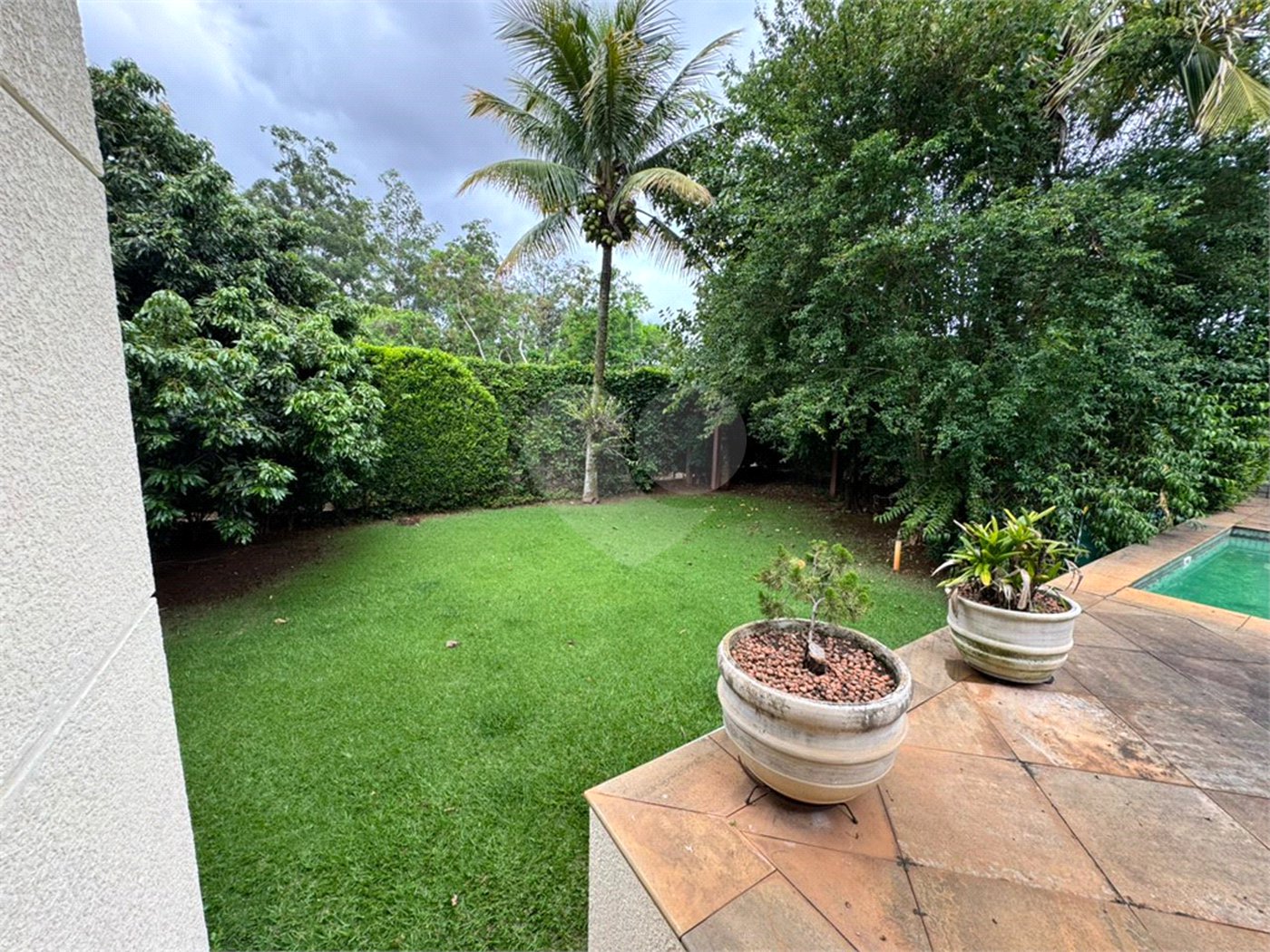 Casa à venda com 5 suítes no condomínio Residencial Bougainville, Campinas - SP