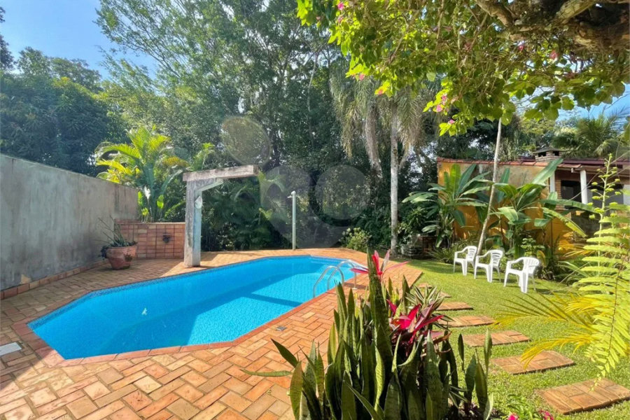 Casa à venda com 8 quartos, sendo 6 suítes, em Riviera de São Lourenço, Bertioga, SP