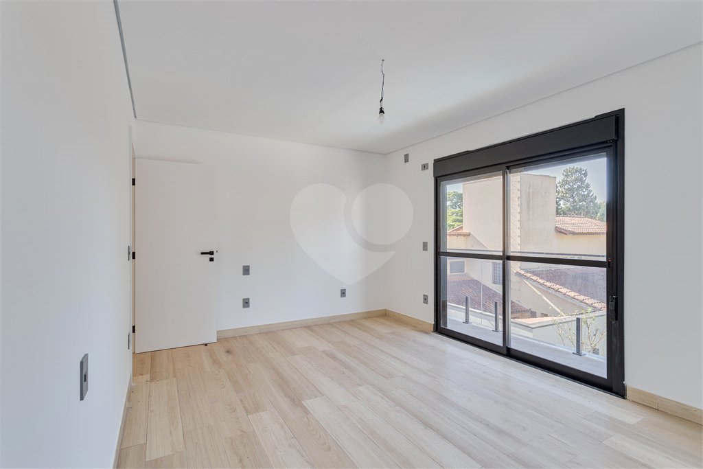 Casa à venda com 4 suítes no condomínio Villa Suiça, São Paulo - SP