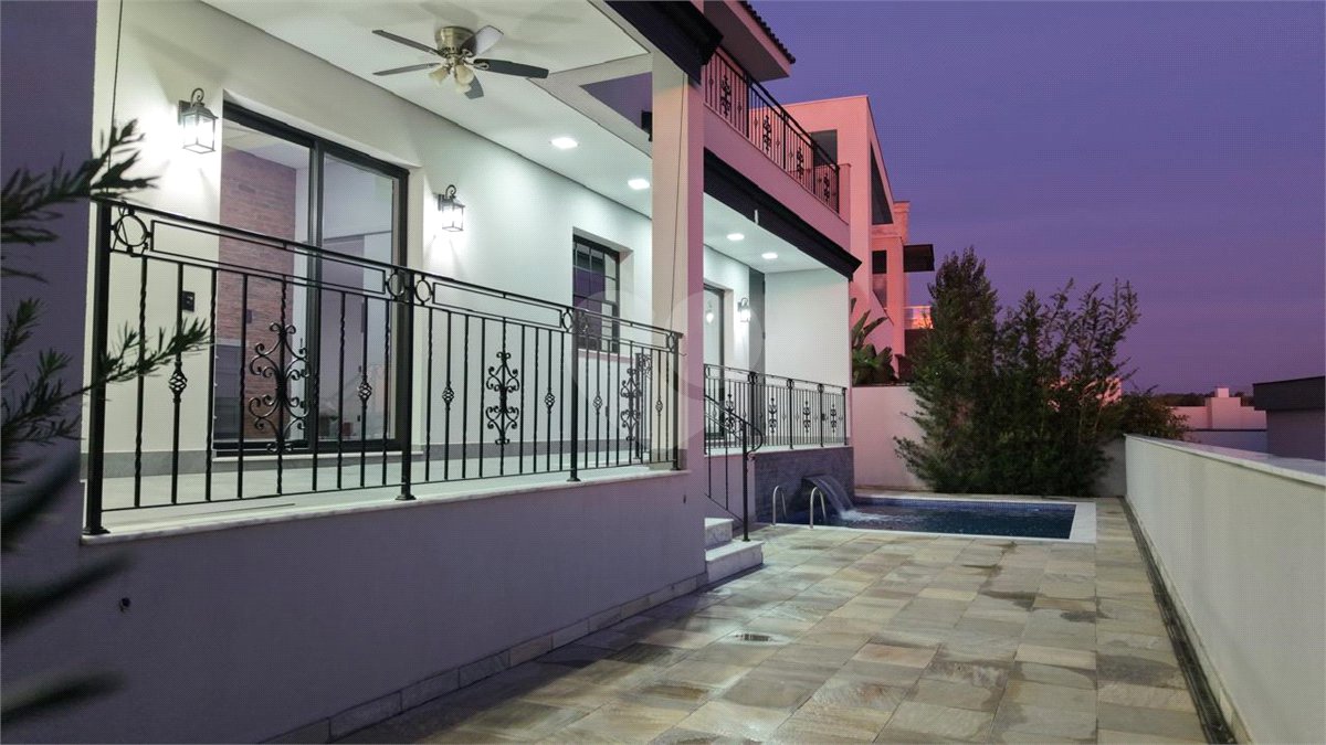 Casa à venda com 4 suítes no condomínio Alphaville Dom Pedro 3, Campinas - SP