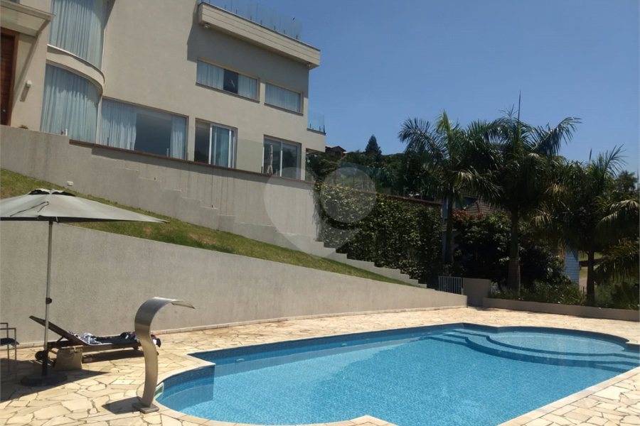 Casa à venda ou para alugar com 4 suítes no condomínio Suíça da Cantareira, Mairiporã - SP