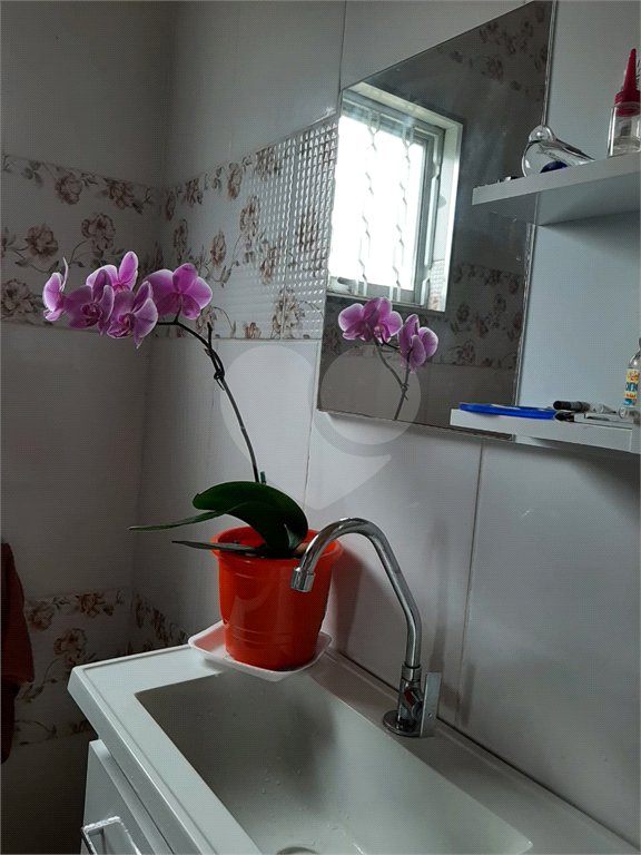 Casa à venda com 2 suítes no condomínio Portal dos Pássaros, Alambari - SP