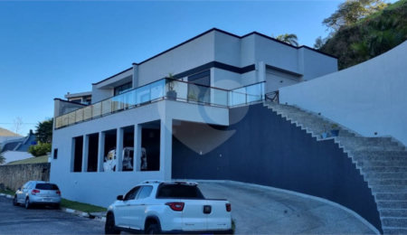 Casa à venda com 4 suítes no condomínio Osato, Atibaia - SP