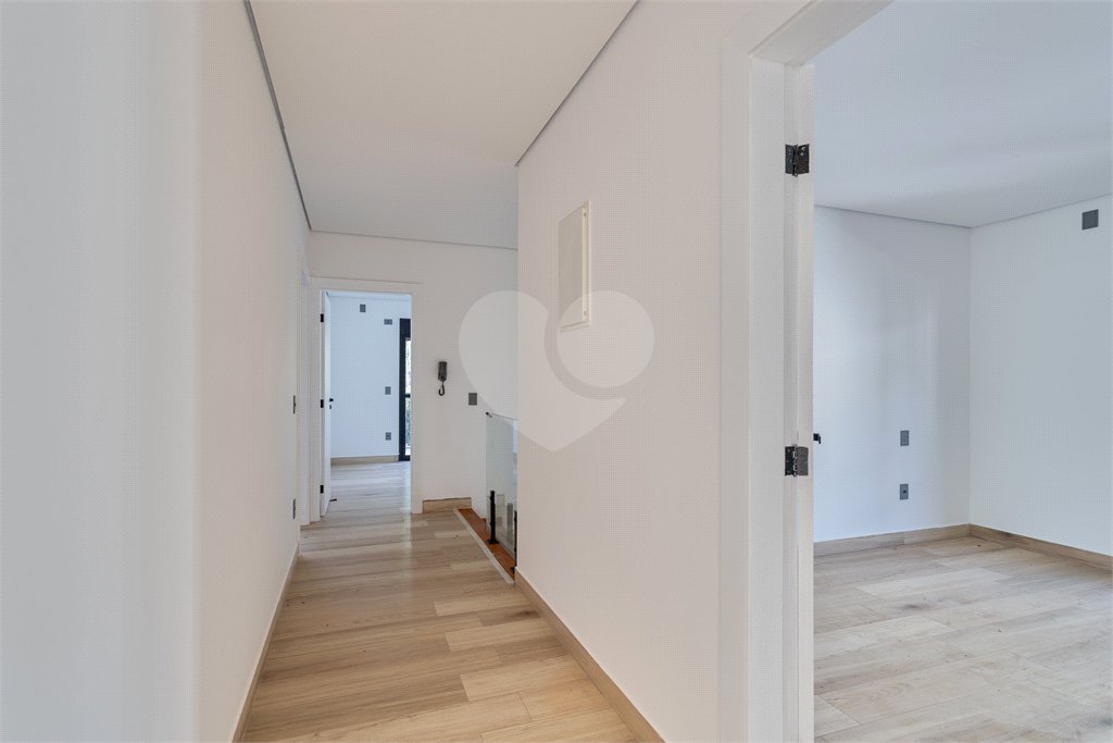Casa à venda com 4 suítes no condomínio Villa Suiça, São Paulo - SP