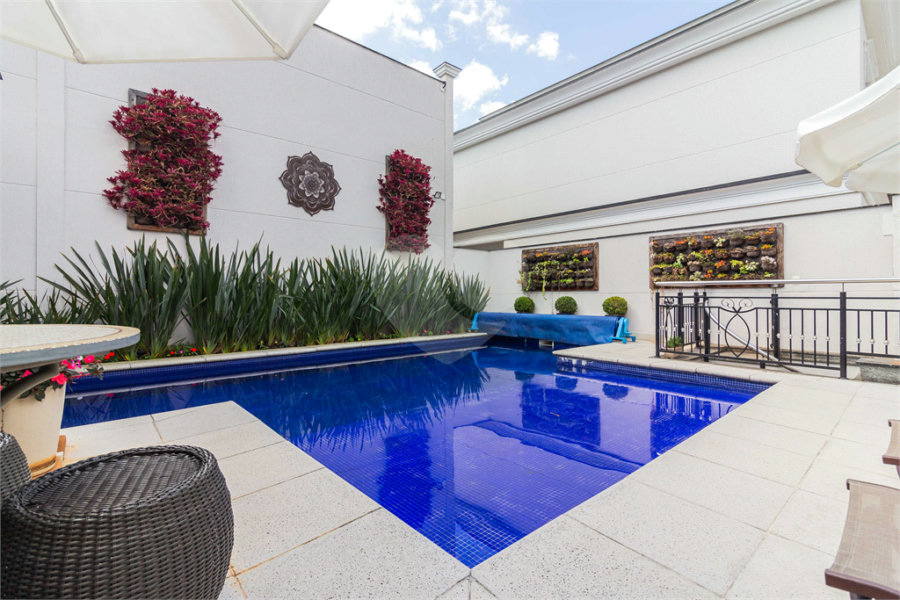 Casa à venda com 4 suítes no condomínio Residencial Quinta das Andorinhas, São Paulo - SP