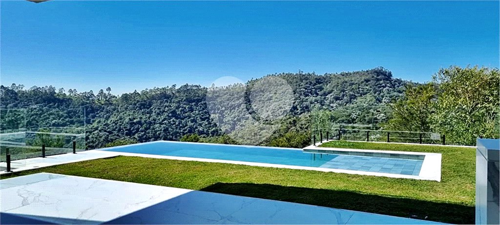 Casa à venda com 4 suítes no condomínio Genesis II, Santana de Parnaíba - SP