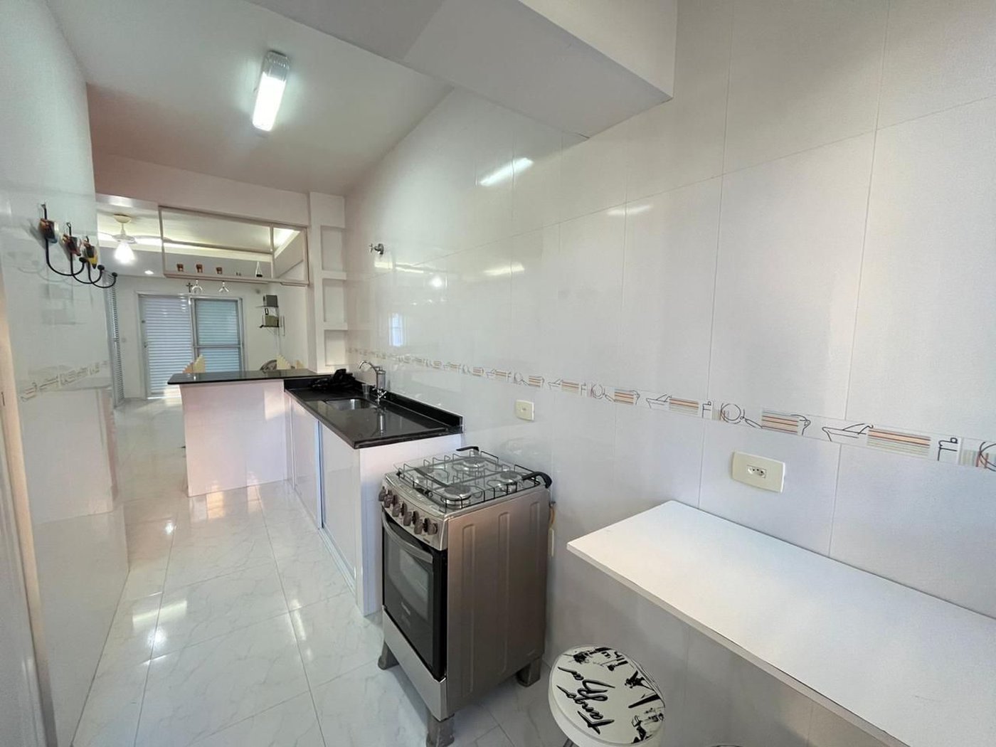 Casa com 2 dormitórios à venda, 80 m² por R$ 440.000,00 - Loteamento João Batista Julião - Guarujá/SP