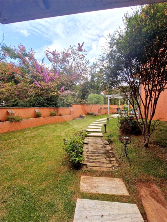Casa à venda com 4 suítes no condomínio Estância Marambaia, Vinhedo - SP