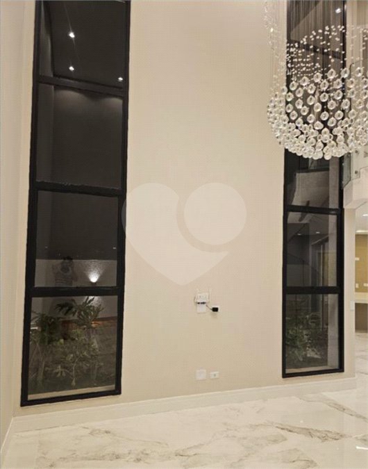 Casa à venda com 4 suítes no condomínio Villas do Jaguari, Santana de Parnaíba - SP