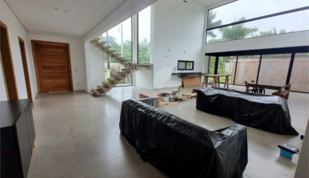 Casa à venda com 4 suítes no condomínio Park Lane, Guarujá - SP