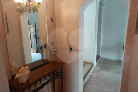 Casa à venda com 4 suítes no condomínio Ville Bourghese, São Paulo - SP