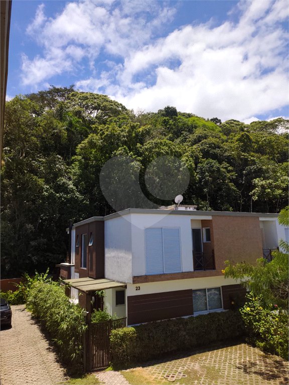 Casa à venda ou para alugar com 4 suítes no condomínio Sambaqui, São Sebastião - SP