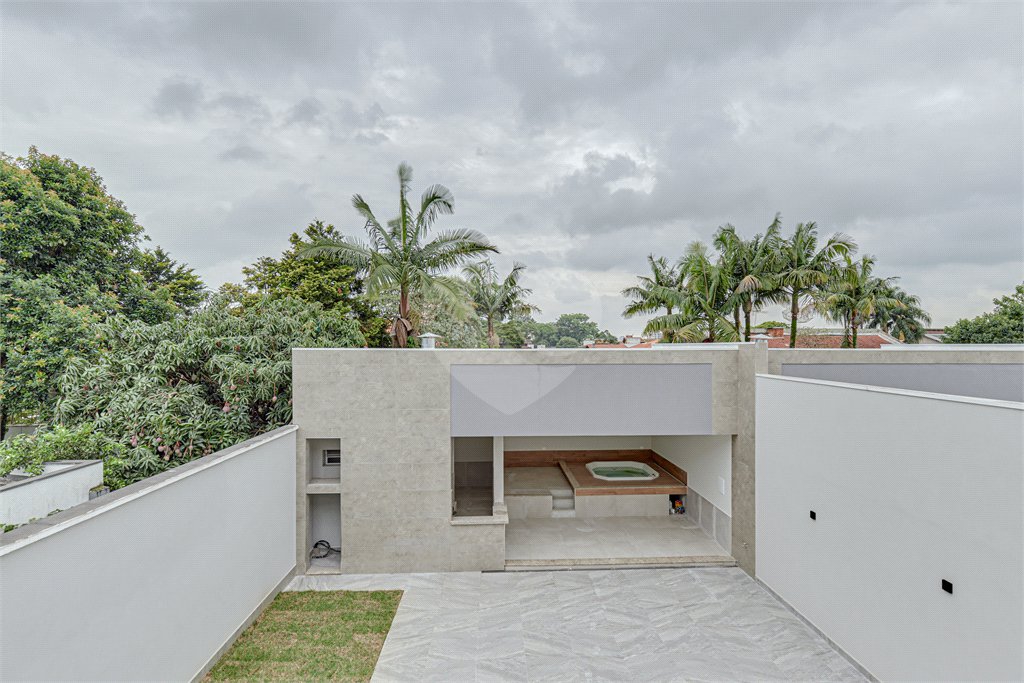 Casa à venda com 4 suítes no condomínio Carmen, São Paulo - SP