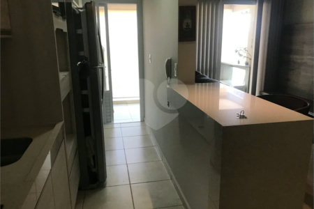 APARTAMENTO MOBILIADO EM FRENTE AO SHOPPING 02 DORMITÒRIOS