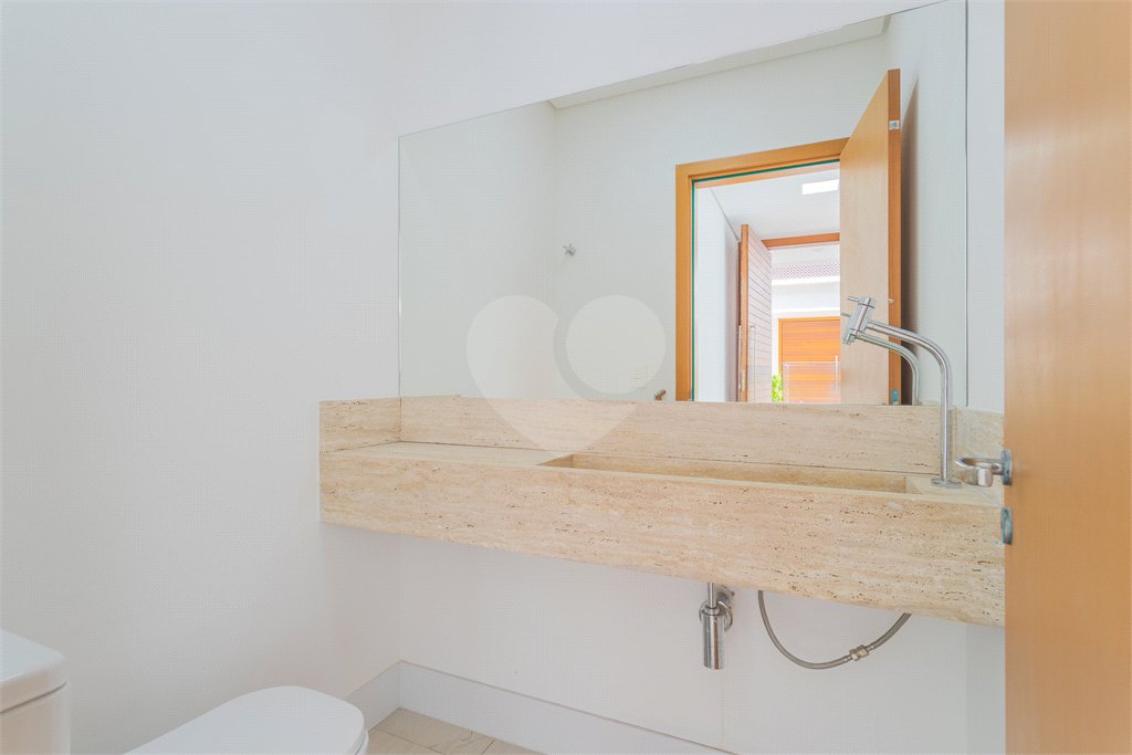 Casa à venda com 4 suítes no condomínio Villagio Quadrifolio, São Paulo - SP