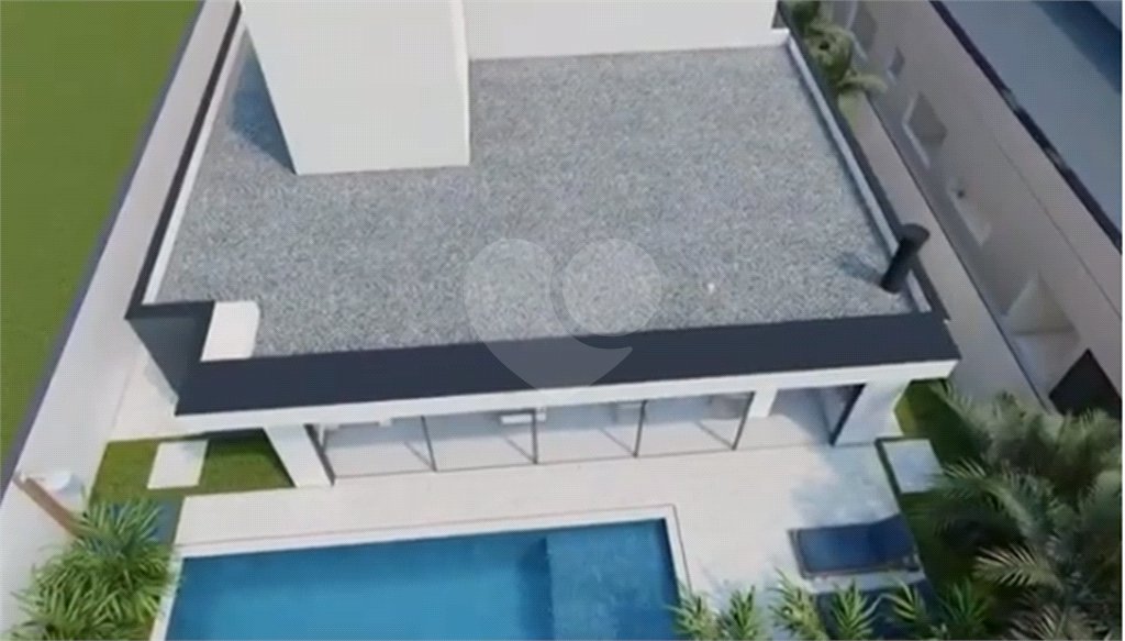 Terreno com casa em construção no Condomínio Alphaville I , em Ribeirão Preto/SP.