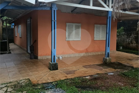 Casa à venda com 4 quartos, sendo 1 suíte,  no condomínio Morada da Praia, Bertioga - SP