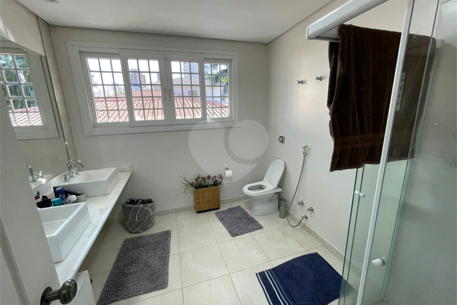 Casa à venda com 4 suítes no condomínio Fechado, São Paulo - SP