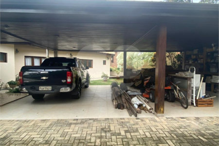 Casa à venda com 4 suítes no condomínio Vale da Santa Fé, Vinhedo - SP