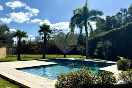 Casa à venda com 4 suítes no condomínio Parque Village Castelo, Itu - SP