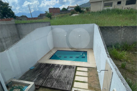 Casa à venda com 3 quartos, sendo 1 suíte, no condomínio Residencial Green Ville, Rio de Janeiro - RJ