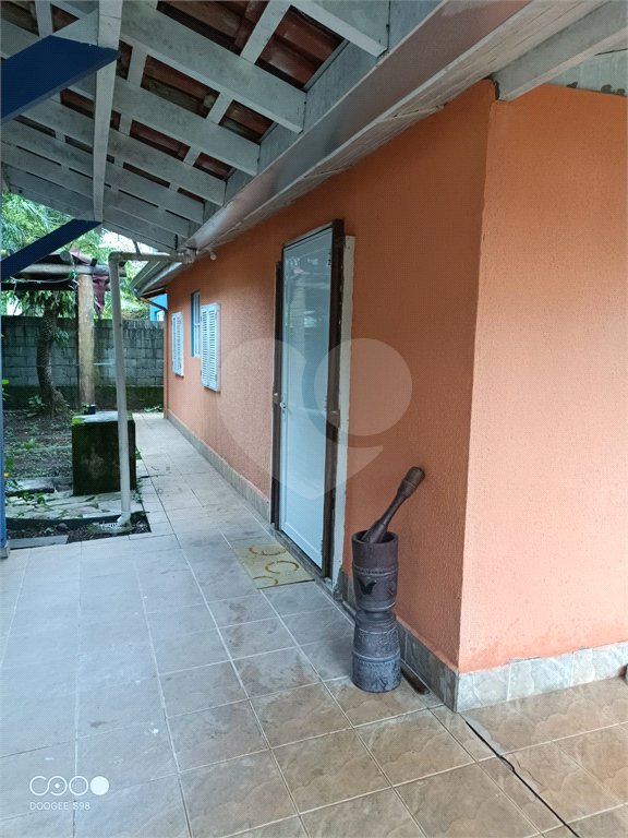 Casa à venda com 4 quartos, sendo 1 suíte,  no condomínio Morada da Praia, Bertioga - SP