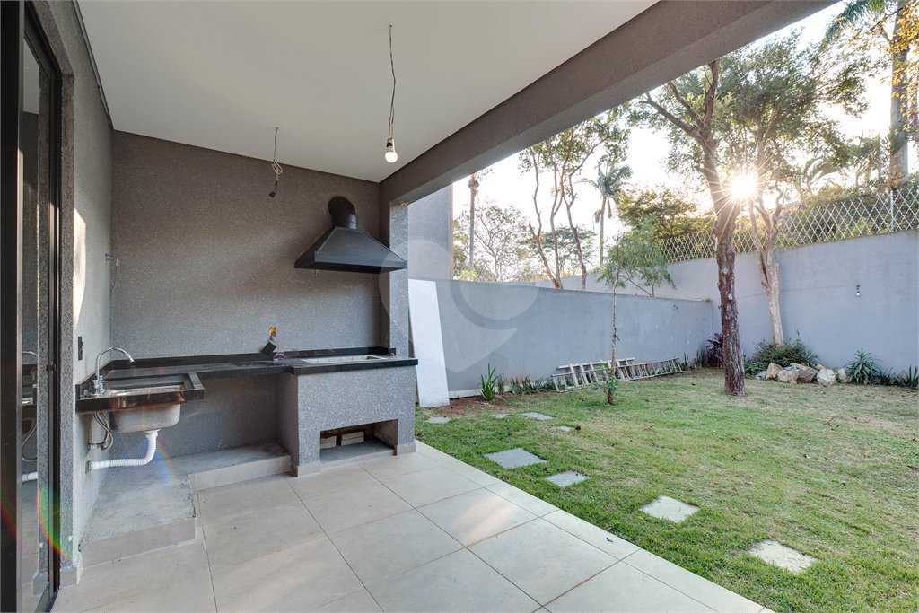 Casa à venda com 4 suítes no condomínio Reserva Robélia, São Paulo - SP