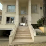 Casa à venda com 4 suítes no condomínio Villaggio Houda, São Paulo - SP