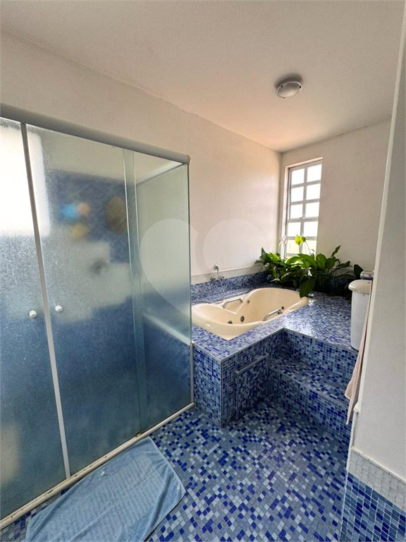 Casa à venda com 5 suítes no condomínio Residencial Bougainville, Campinas - SP