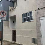 Casa com 3 dormitórios à venda, 116 m² por R$ 690.000,00 - Gonzaga - Santos/SP