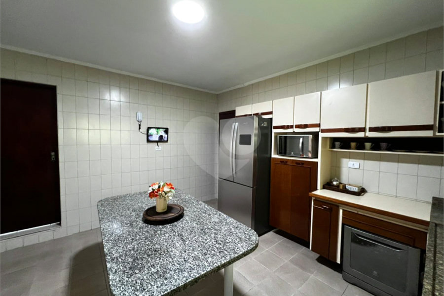 Casa à venda com 4 suítes no condomínio Alpes da Cantareira, Mairiporã - SP