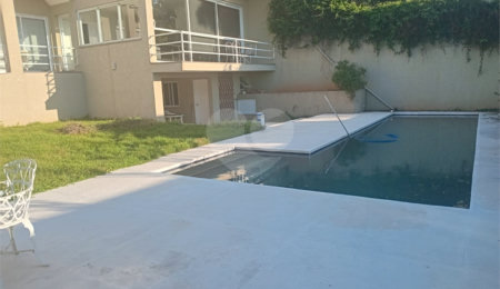 Casa à venda com 4 quartos, sendo 3 suítes,  no condomínio Arco Iris, Atibaia - SP