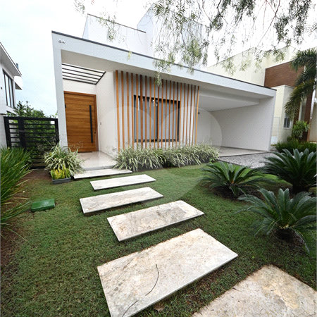 Indaiatuba - SP - Condomínio Helvetia Park - 490 m² Terreno - Sobrado com 307 m² de Área Construída - Escritório com móveis planejados - Sala de estar e jantar ampla e integradas - Cozinha planejada completa, com eletrodomésticos (cooktop, forno, coifa, geladeira, microondas) - Lavanderia