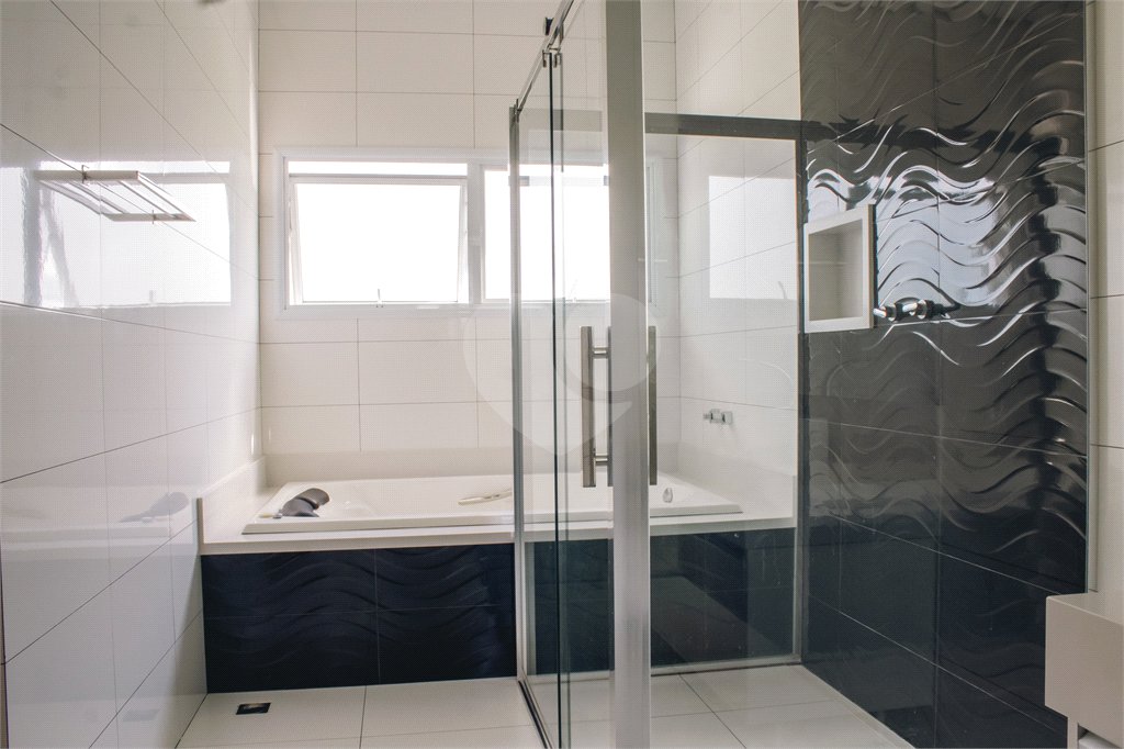 Casa à venda com 4 suítes no condomínio Residencial Saint Charbel, Araçoiaba da Serra - SP