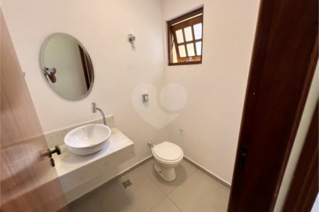 Casa à venda ou para alugar com 4 quartos, sendo 3 suítes, no condomínio Estância Marambaia, Vinhedo - SP