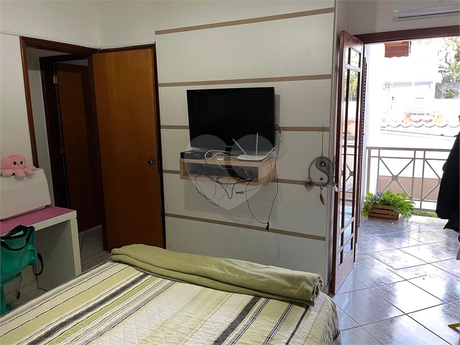 Casa à venda com 3 quartos, sendo 2 suítes, no condomínio Palmas, São Paulo - SP