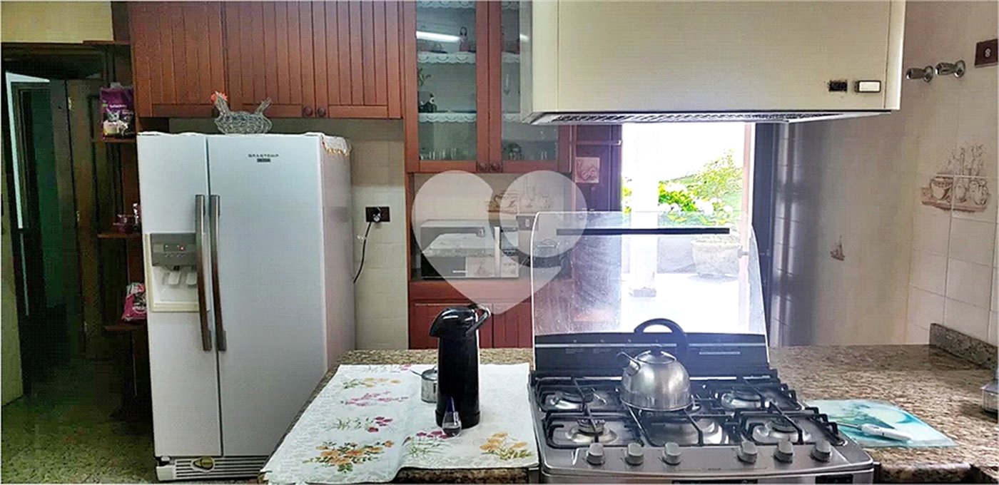 Casa à venda com 4 suítes no condomínio Alpes da Cantareira, Mairiporã - SP