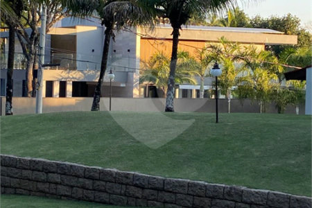Casa à venda ou para alugar com 4 suítes no condomínio Estância Marambaia, Vinhedo - SP