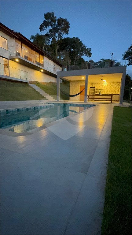 Casa à venda com 4 suítes no condomínio Portal Ouro Verde, Atibaia - SP