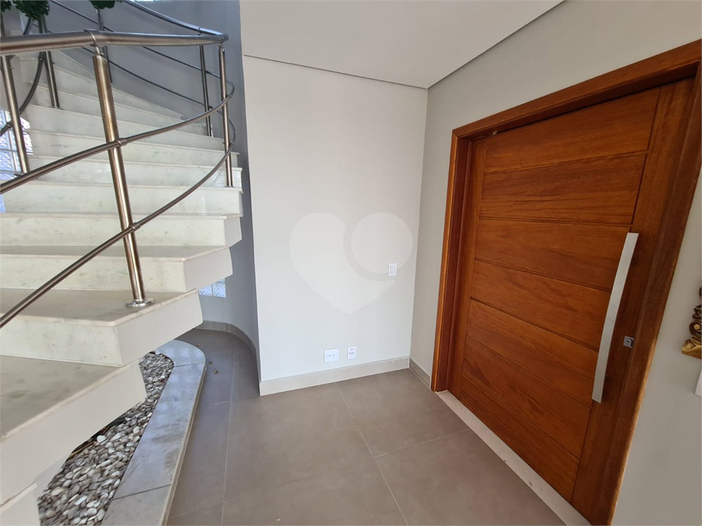 Casa à venda com 3 suítes no condomínio Estância Marambaia, Vinhedo - SP