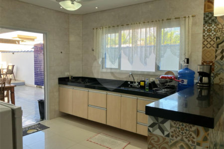 Casa à venda com 4 quartos, sendo 2 suítes,  no condomínio Morada da Praia, Bertioga - SP