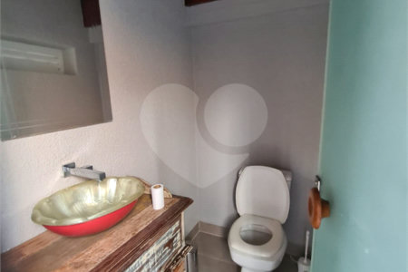 Casa à venda com 3 suítes no condomínio Estância Marambaia, Vinhedo - SP