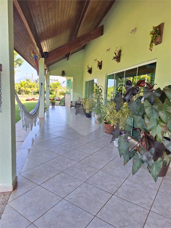 Casa à venda com 4 suítes no condomínio Bougainville, Peruíbe - SP