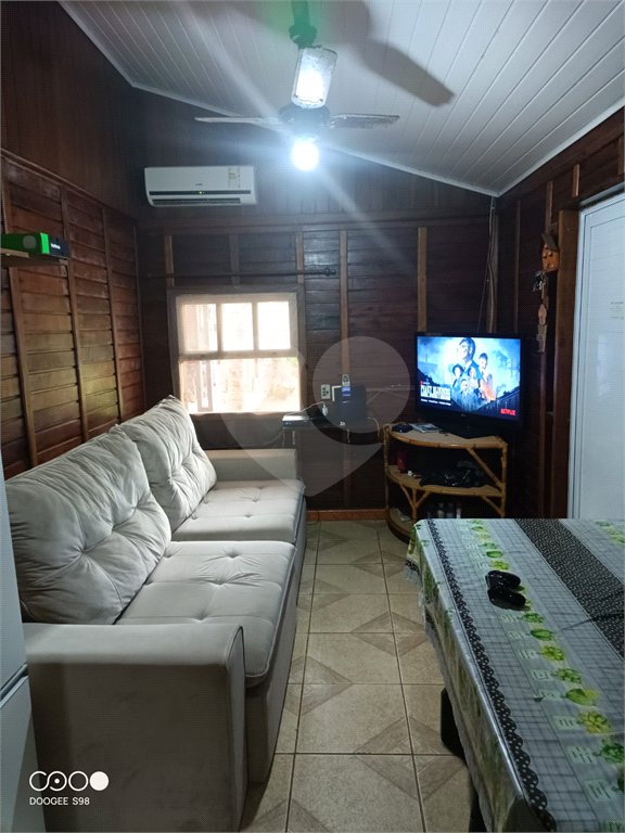 Casa à venda com 4 quartos, sendo 1 suíte,  no condomínio Morada da Praia, Bertioga - SP