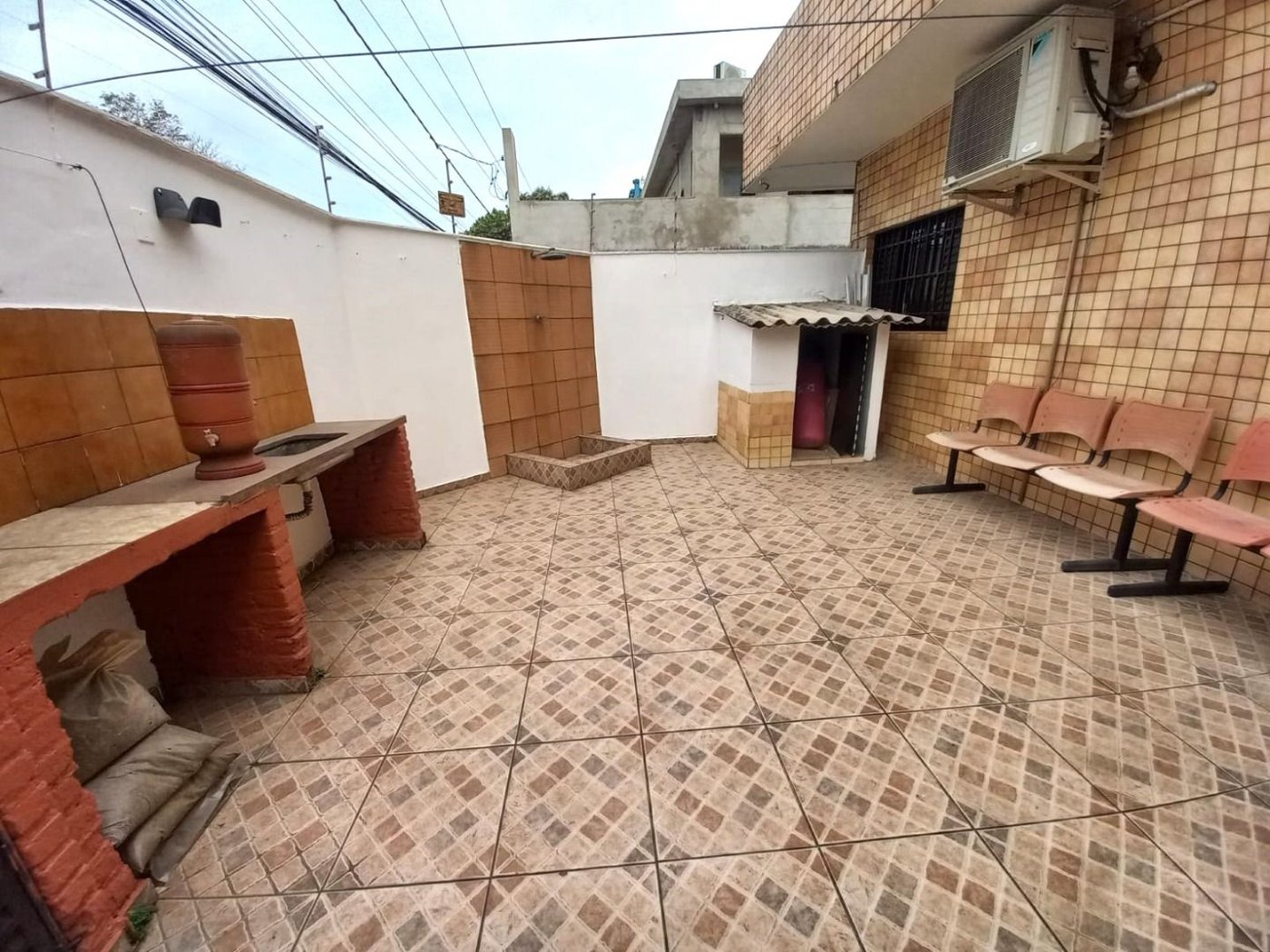 Casa com 3 dormitórios à venda, 150 m² por R$ 960.000,00 - Macuco - Santos/SP