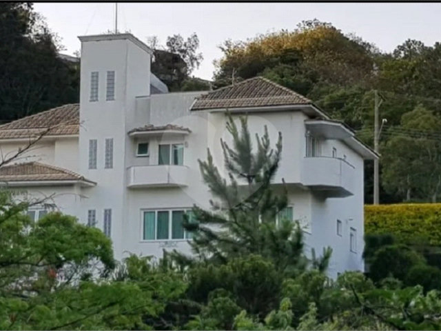 Casa à venda com 4 suítes no condomínio Monte Samkhya, Serra Negra - SP