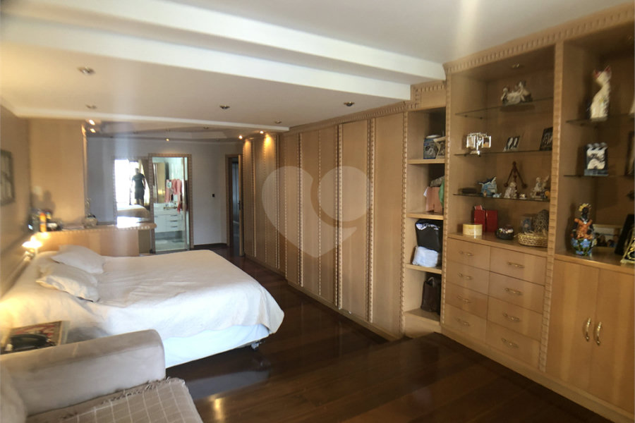 Casa à venda com 4 suítes no condomínio Residencial Floresta, São Paulo - SP